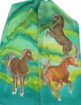horses on green silk with yellow and blue